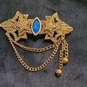 Vintage 80's A.J.C. Goldtone Textured Star And Blue Detail Brooch With Chains